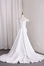 Load image into Gallery viewer, 2024 Satin Mermaid Off The Shoulder Wedding Dresses With Applique And Sash