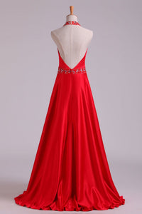 2024 Open Back A Line Halter Satin Prom Dresses With Beading Floor Length