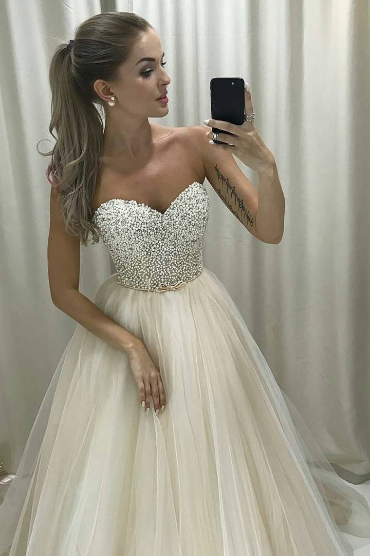 2023 New Arrival Sweetheart A Line Tulle Wedding Dresses With Beading