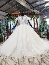 Load image into Gallery viewer, Ball Gown Round Neck Ivory Beads Open Back Wedding Dresses Quinceanera Dresses W1056