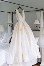 Load image into Gallery viewer, Elegant Straps V Neck Ball Gown Ivory Satin Backless Wedding Dresses with Pockets W1089