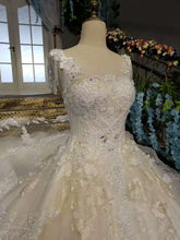 Load image into Gallery viewer, 2024 New Arrival Wedding Dresses Off The Shoulder With Beads And Handmade Flowers Lace Up