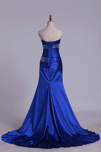2024 Mermaid Strapless Dark Royal Blue Sweep Train Elastic Satin With Beadings Prom Dresses