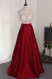 2024 A Line Prom Dresses Scoop Beaded Bodice Short Sleeves Satin