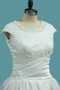 2023 Scoop Cap Sleeve Wedding Dresses A Line Satin With Ruffles And Applique Sweep Train