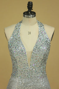 2024 Prom Dresses Halter Sequines With Beading Open Back Sheath